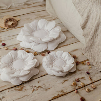 Coussin fleur en peluche