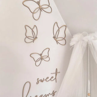 Ensemble de papillons en bois avec le texte « Sweet Dreams »