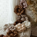 Coussin fleur en peluche