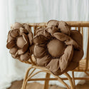 Coussin fleur en peluche