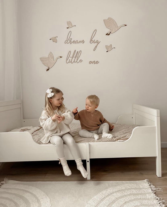 Wooden set of geese with the text "Dream big little one"